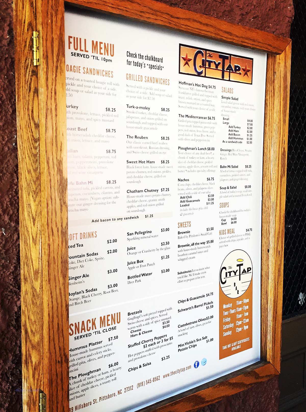 The menu board for the City Tap.